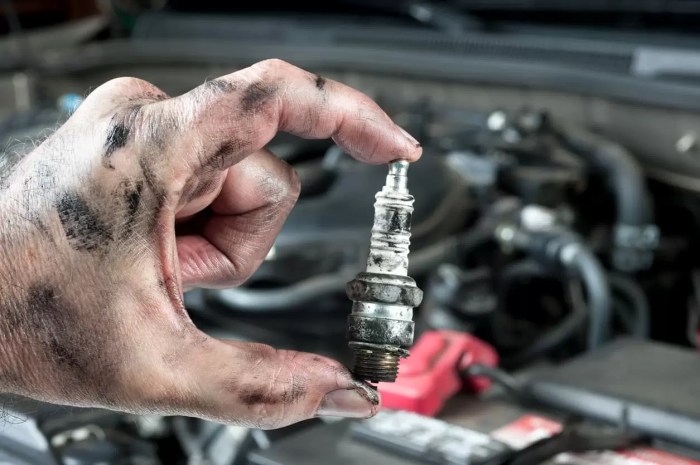 Tune hood unrecognizable mechanic repairman shining screwdriver Tune hood unrecognizable mechanic repairman shining screwdriver